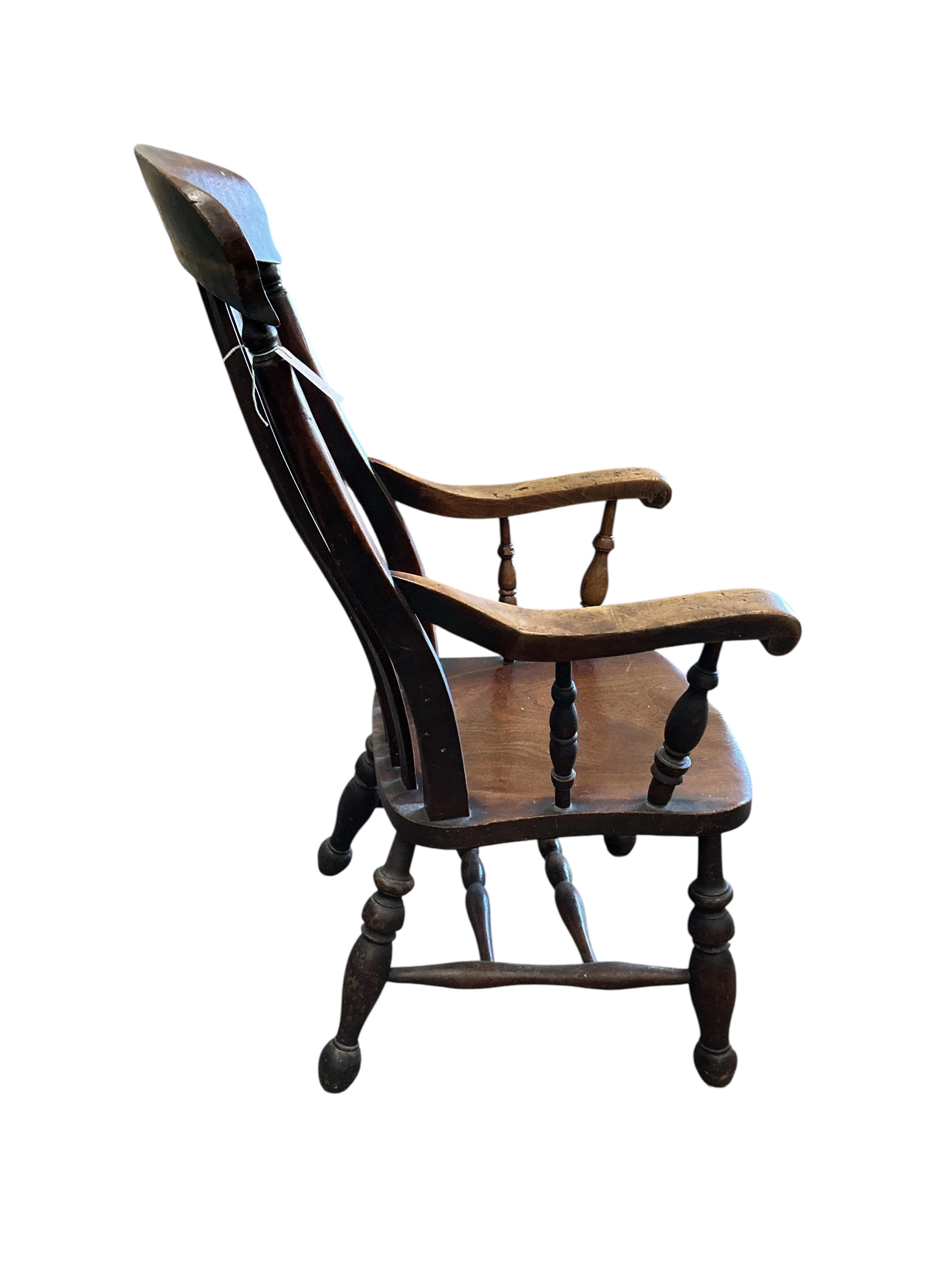 A Victorian elm and beech Windsor lathe back armchair, width 54cm, depth 52cm, height 108cm